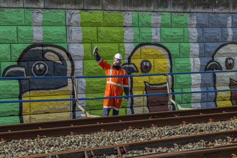 Talented artist flying high for major KiwiRail mural project